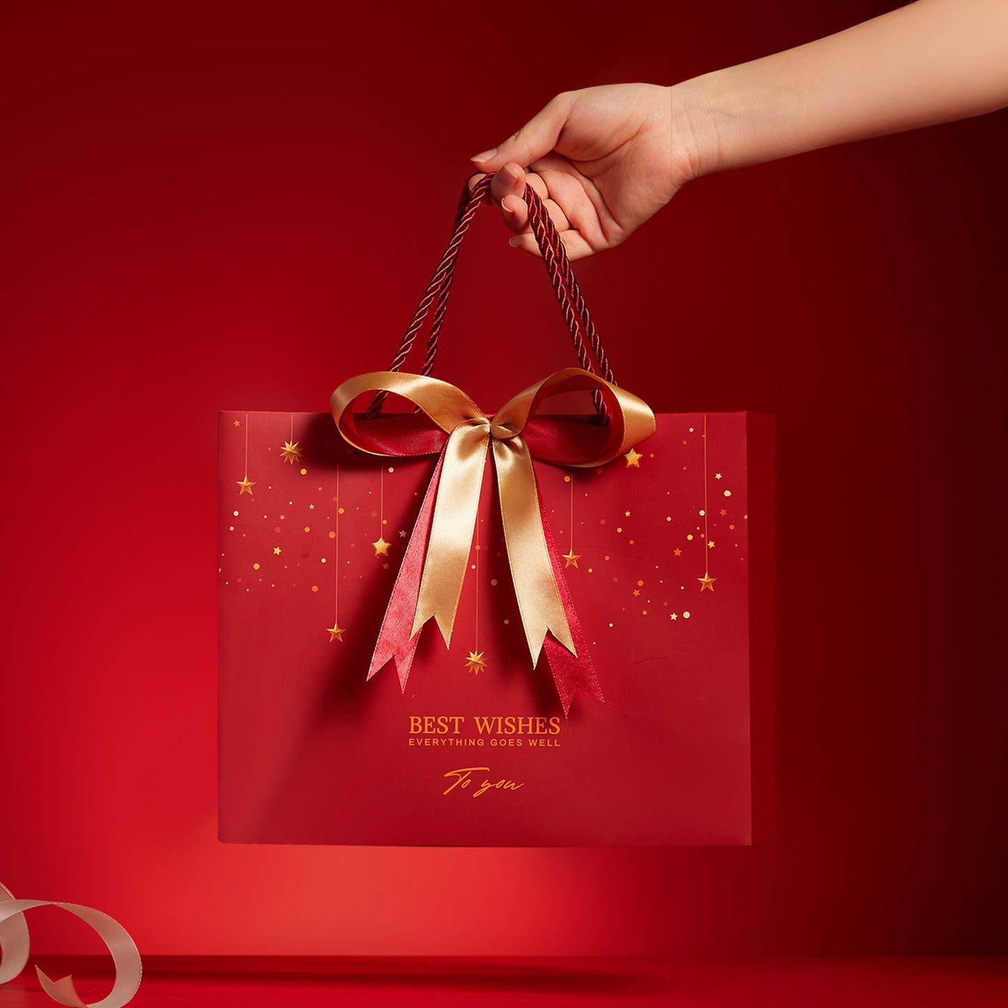 Shimmering Star Print Gift Bag with Golden Bow